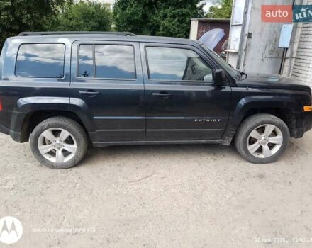 Чорний Джип Patriot, об'ємом двигуна 2.4 л та пробігом 285 тис. км за 8000 $, фото 11 на Automoto.ua