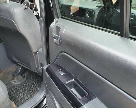 Черный Джип Патриот, объемом двигателя 2.36 л и пробегом 155 тыс. км за 10500 $, фото 13 на Automoto.ua