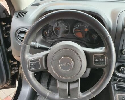 Черный Джип Патриот, объемом двигателя 2.4 л и пробегом 154 тыс. км за 10500 $, фото 1 на Automoto.ua