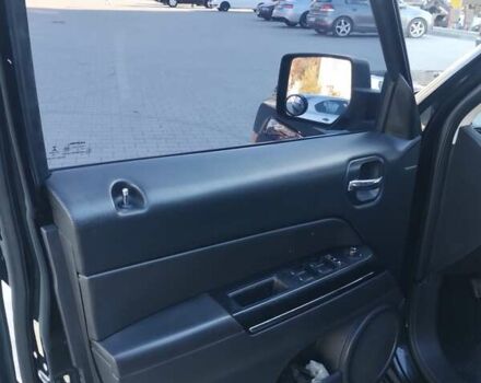 Черный Джип Патриот, объемом двигателя 2.36 л и пробегом 220 тыс. км за 12000 $, фото 10 на Automoto.ua