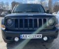 Черный Джип Патриот, объемом двигателя 2.4 л и пробегом 250 тыс. км за 11600 $, фото 1 на Automoto.ua