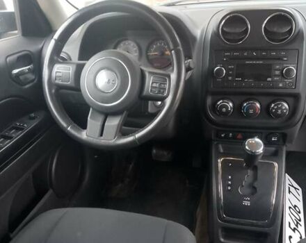 Чорний Джип Patriot, об'ємом двигуна 2.4 л та пробігом 285 тис. км за 8000 $, фото 1 на Automoto.ua