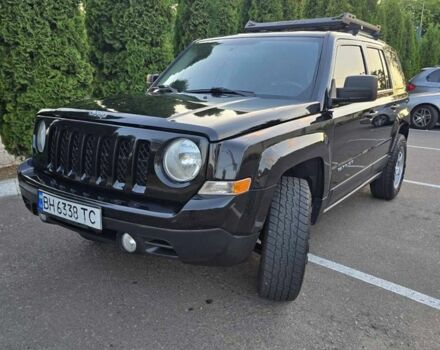 Чорний Джип Patriot, об'ємом двигуна 2.4 л та пробігом 158 тис. км за 9500 $, фото 1 на Automoto.ua