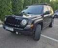 Чорний Джип Patriot, об'ємом двигуна 2.4 л та пробігом 158 тис. км за 9500 $, фото 1 на Automoto.ua