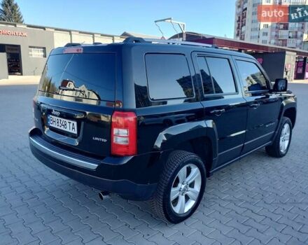 Черный Джип Патриот, объемом двигателя 2.36 л и пробегом 220 тыс. км за 12000 $, фото 3 на Automoto.ua