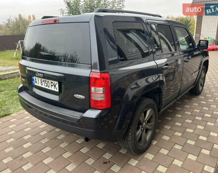 Джип Патриот 2014 в Борисполе на Automoto.ua Черный Джип Патриот, объемом двигателя 2.36 л и пробегом 80 тыс. км за 10500 $, фото 7 на Automoto.ua
