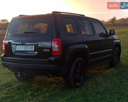 Черный Джип Патриот, объемом двигателя 2 л и пробегом 135 тыс. км за 9900 $, фото 3 на Automoto.ua