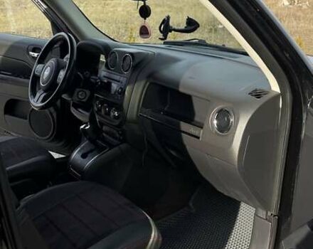 Черный Джип Патриот, объемом двигателя 2.36 л и пробегом 117 тыс. км за 10500 $, фото 10 на Automoto.ua