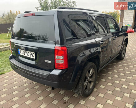 Джип Патриот 2014 в Борисполе на Automoto.ua Черный Джип Патриот, объемом двигателя 2.36 л и пробегом 80 тыс. км за 10500 $, фото 6 на Automoto.ua