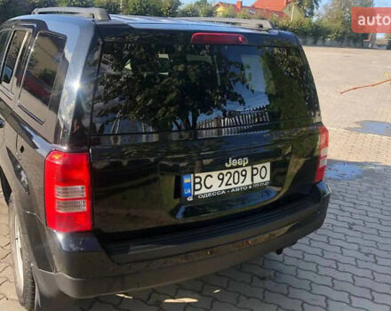 Черный Джип Патриот, объемом двигателя 2 л и пробегом 162 тыс. км за 8900 $, фото 3 на Automoto.ua
