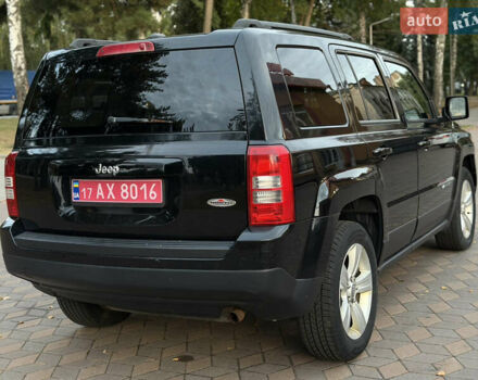 Черный Джип Патриот, объемом двигателя 2.4 л и пробегом 197 тыс. км за 9999 $, фото 58 на Automoto.ua