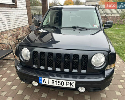 Джип Патриот 2014 в Борисполе на Automoto.ua Черный Джип Патриот, объемом двигателя 2.36 л и пробегом 80 тыс. км за 10500 $, фото 2 на Automoto.ua