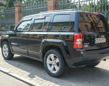 Черный Джип Патриот, объемом двигателя 2.4 л и пробегом 102 тыс. км за 10800 $, фото 2 на Automoto.ua