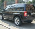Черный Джип Патриот, объемом двигателя 2.4 л и пробегом 102 тыс. км за 10800 $, фото 2 на Automoto.ua