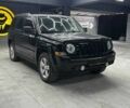 Чорний Джип Patriot, об'ємом двигуна 2.4 л та пробігом 104 тис. км за 11100 $, фото 1 на Automoto.ua