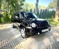 Чорний Джип Patriot, об'ємом двигуна 2.4 л та пробігом 120 тис. км за 10000 $, фото 1 на Automoto.ua