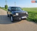 Черный Джип Патриот, объемом двигателя 2.4 л и пробегом 154 тыс. км за 11100 $, фото 1 на Automoto.ua