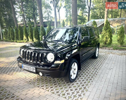 Черный Джип Патриот, объемом двигателя 2.36 л и пробегом 120 тыс. км за 10000 $, фото 1 на Automoto.ua