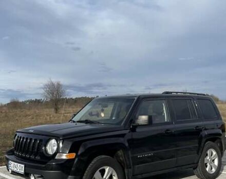 Черный Джип Патриот, объемом двигателя 2.36 л и пробегом 117 тыс. км за 10500 $, фото 1 на Automoto.ua