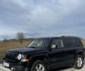 Черный Джип Патриот, объемом двигателя 2.36 л и пробегом 117 тыс. км за 10500 $, фото 1 на Automoto.ua