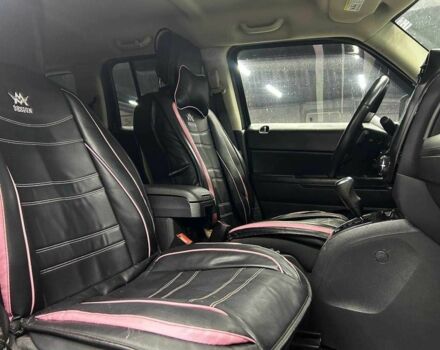 Чорний Джип Patriot, об'ємом двигуна 2.4 л та пробігом 104 тис. км за 11100 $, фото 13 на Automoto.ua