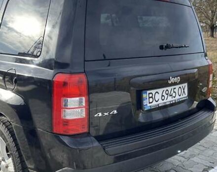 Черный Джип Патриот, объемом двигателя 2.36 л и пробегом 117 тыс. км за 10500 $, фото 2 на Automoto.ua