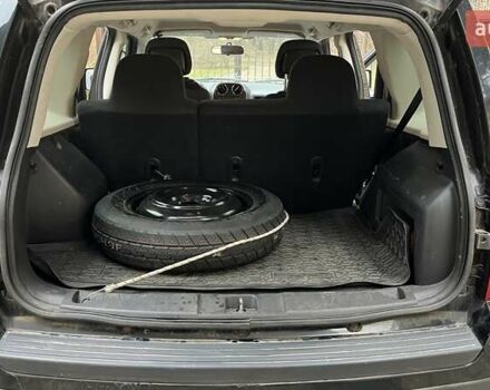 Черный Джип Патриот, объемом двигателя 2.36 л и пробегом 157 тыс. км за 9400 $, фото 7 на Automoto.ua