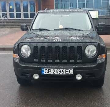 Черный Джип Патриот, объемом двигателя 2.36 л и пробегом 180 тыс. км за 9700 $, фото 1 на Automoto.ua