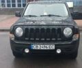 Черный Джип Патриот, объемом двигателя 2.36 л и пробегом 180 тыс. км за 9700 $, фото 1 на Automoto.ua