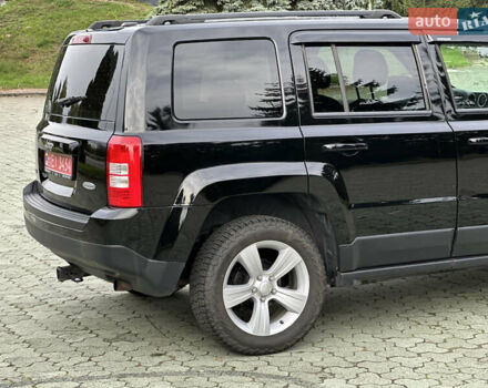 Джип Патриот 2014 в Дубно на Automoto.ua Черный Джип Патриот, объемом двигателя 2.4 л и пробегом 236 тыс. км за 8800 $, фото 5 на Automoto.ua