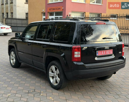 Джип Патриот 2014 в Лубнах на Automoto.ua Черный Джип Патриот, объемом двигателя 2.4 л и пробегом 197 тыс. км за 9999 $, фото 41 на Automoto.ua