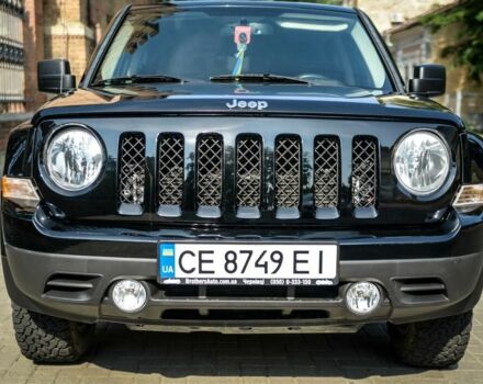 Черный Джип Патриот, объемом двигателя 2.4 л и пробегом 102 тыс. км за 10800 $, фото 1 на Automoto.ua