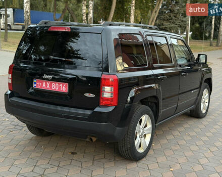 Черный Джип Патриот, объемом двигателя 2.4 л и пробегом 197 тыс. км за 9999 $, фото 52 на Automoto.ua