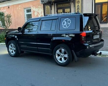 Черный Джип Патриот, объемом двигателя 2.4 л и пробегом 84 тыс. км за 15000 $, фото 3 на Automoto.ua