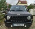 Чорний Джип Patriot, об'ємом двигуна 2.36 л та пробігом 195 тис. км за 8500 $, фото 1 на Automoto.ua
