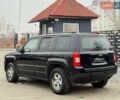 Черный Джип Патриот, объемом двигателя 2.36 л и пробегом 241 тыс. км за 8800 $, фото 3 на Automoto.ua