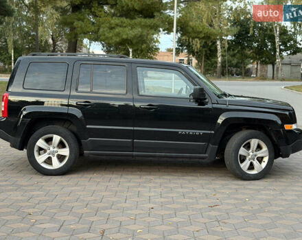 Джип Патриот 2014 в Лубнах на Automoto.ua Черный Джип Патриот, объемом двигателя 2.4 л и пробегом 197 тыс. км за 9999 $, фото 38 на Automoto.ua