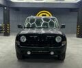 Чорний Джип Patriot, об'ємом двигуна 2.4 л та пробігом 104 тис. км за 11100 $, фото 1 на Automoto.ua
