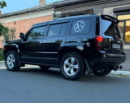 Черный Джип Патриот, объемом двигателя 2.4 л и пробегом 84 тыс. км за 15000 $, фото 4 на Automoto.ua