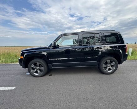 Черный Джип Патриот, объемом двигателя 2.4 л и пробегом 169 тыс. км за 11100 $, фото 1 на Automoto.ua