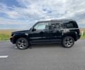 Черный Джип Патриот, объемом двигателя 2.4 л и пробегом 169 тыс. км за 11100 $, фото 1 на Automoto.ua