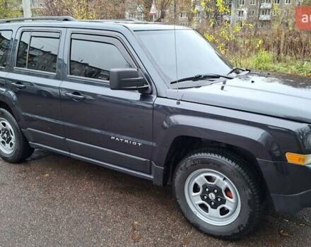 Черный Джип Патриот, объемом двигателя 2.36 л и пробегом 187 тыс. км за 10800 $, фото 1 на Automoto.ua