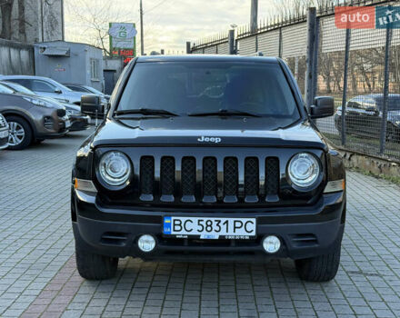 Чорний Джип Patriot, об'ємом двигуна 2.4 л та пробігом 128 тис. км за 10300 $, фото 1 на Automoto.ua