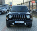 Чорний Джип Patriot, об'ємом двигуна 2.4 л та пробігом 128 тис. км за 10300 $, фото 1 на Automoto.ua