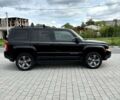 Чорний Джип Patriot, об'ємом двигуна 2.4 л та пробігом 250 тис. км за 10000 $, фото 1 на Automoto.ua