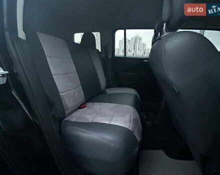 Чорний Джип Patriot, об'ємом двигуна 2.36 л та пробігом 145 тис. км за 10990 $, фото 12 на Automoto.ua