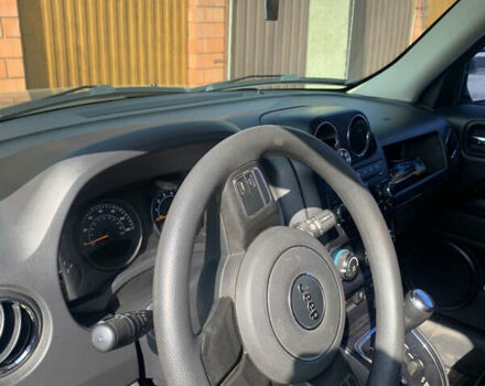 Черный Джип Патриот, объемом двигателя 2.4 л и пробегом 200 тыс. км за 12000 $, фото 2 на Automoto.ua