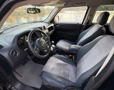 Черный Джип Патриот, объемом двигателя 2.36 л и пробегом 144 тыс. км за 10500 $, фото 17 на Automoto.ua