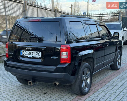 Чорний Джип Patriot, об'ємом двигуна 2.4 л та пробігом 128 тис. км за 10300 $, фото 6 на Automoto.ua