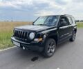 Черный Джип Патриот, объемом двигателя 2.4 л и пробегом 169 тыс. км за 11100 $, фото 1 на Automoto.ua